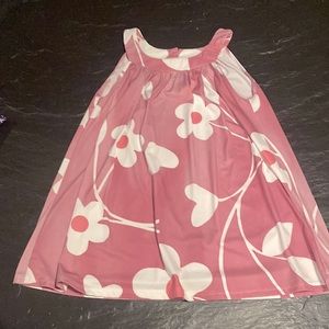 Beach Mod float top. Think “Martha” from the Brady bunch🌸size S but fits loose